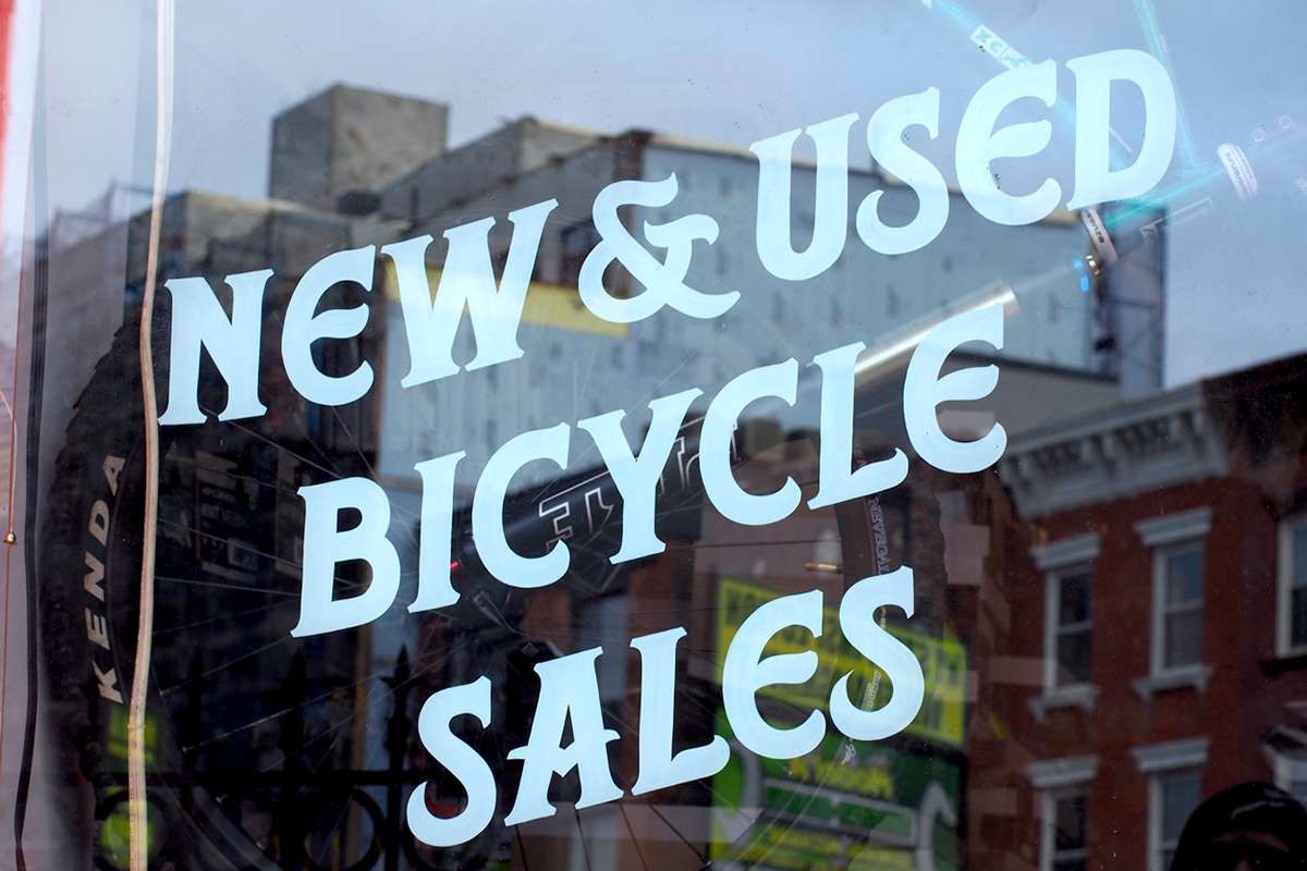 sign painting lettering window signs Bicycles Bike Shop Storefront Hand Painted