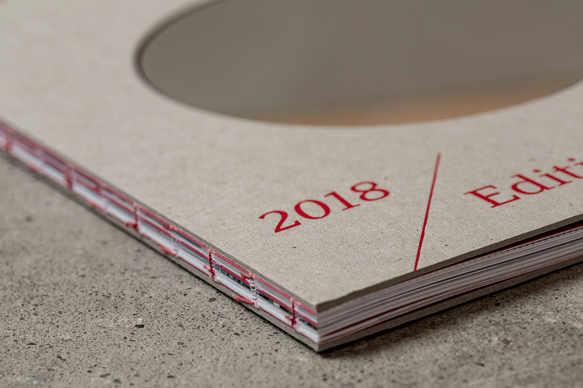 annual report Bookdesign finance magazine mirror thread binding print finishing red special binding cardboard