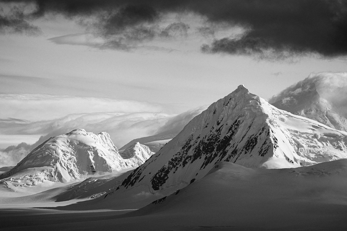 antarctica black & white clouds dark glacier ice Landscape mountains peak snow
