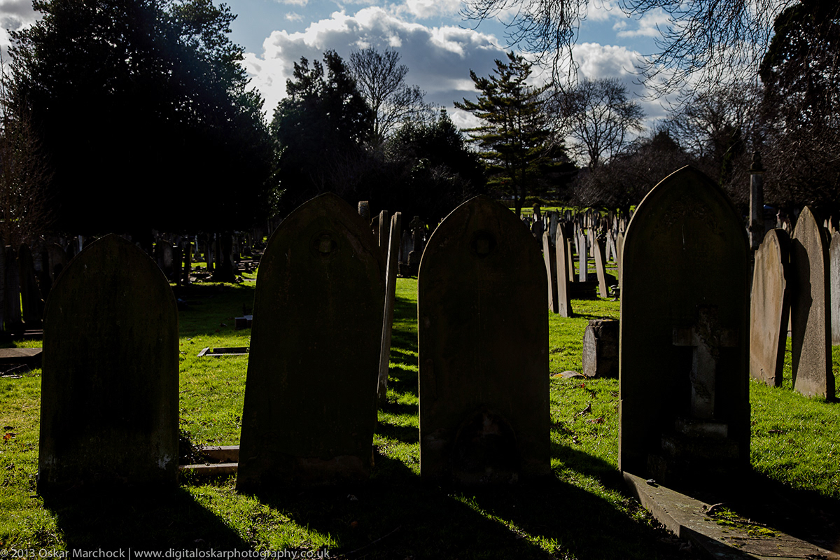 cemetery stones shadow contrast light peace quiet death rest