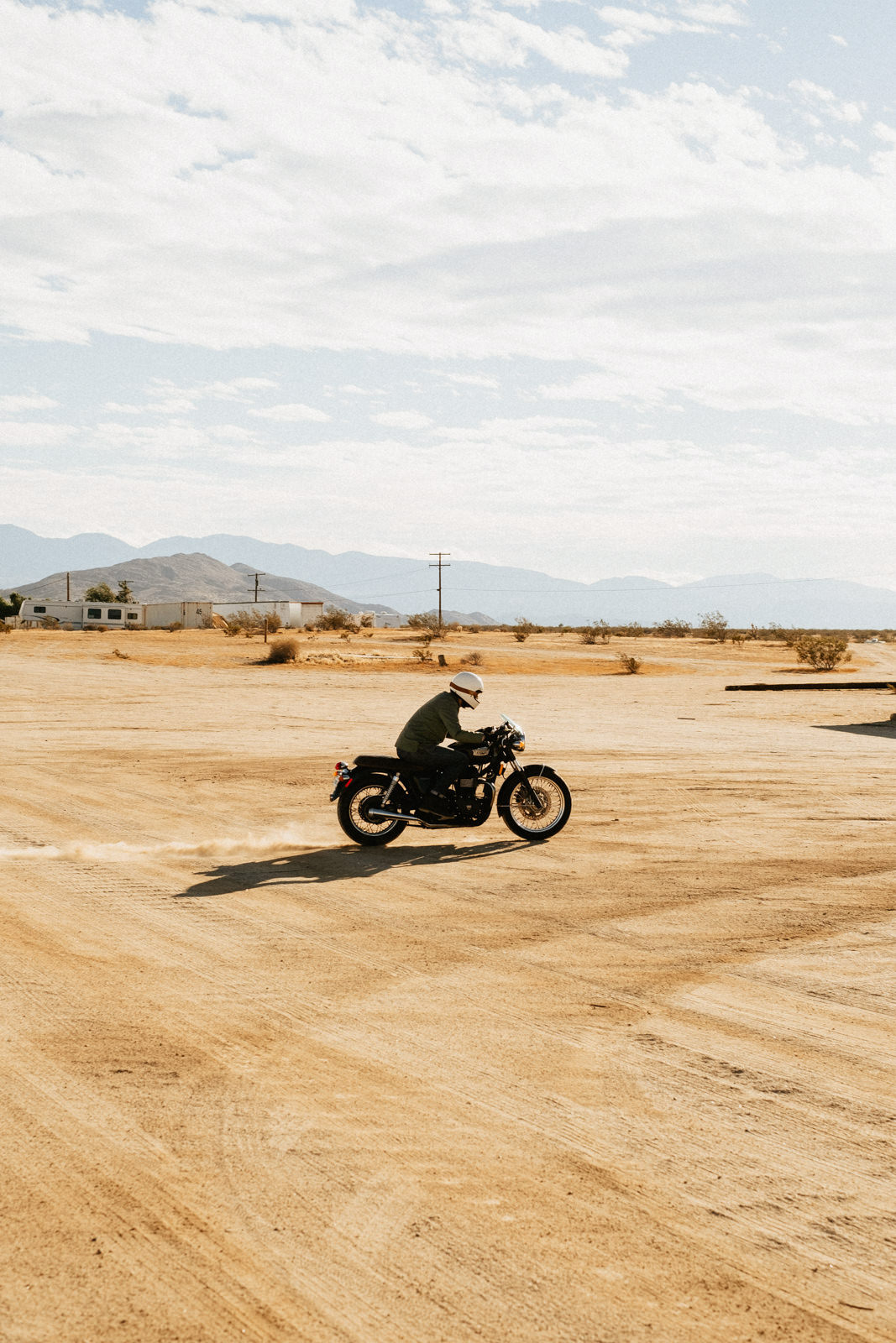 motorbike ride adventure wild folk California desert jeans triumph cafe racer