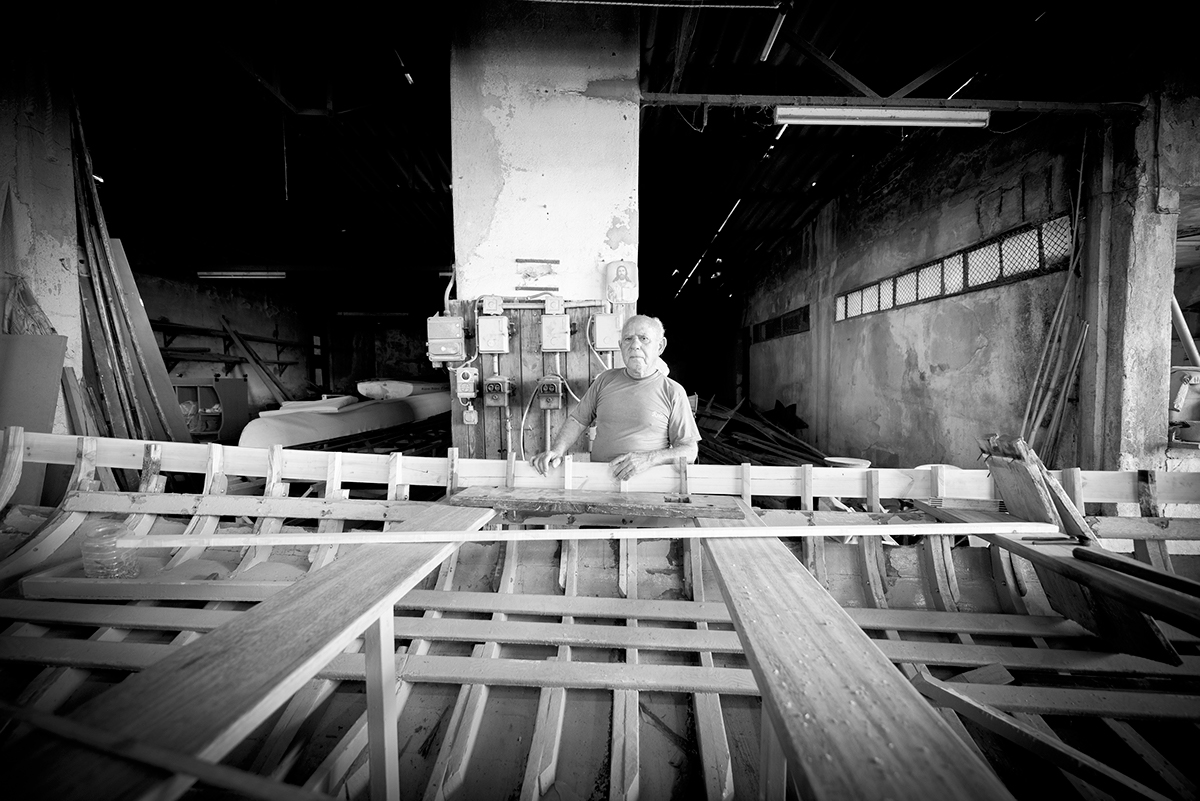 A person who designs builds and repairs ships especially wooden ones. shipwright old man bnw blackandwhite digital ship wood
