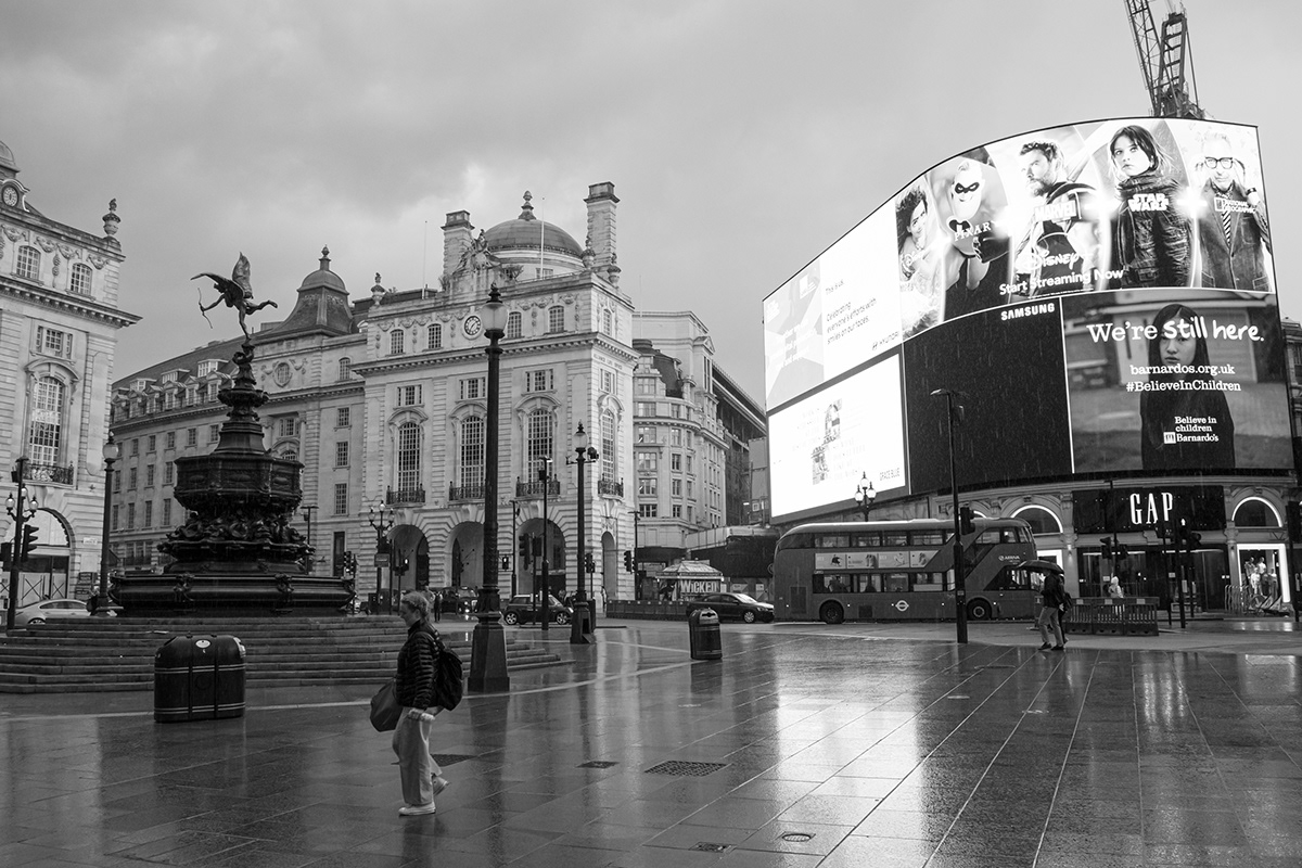 black and white London Picadilly circus rain