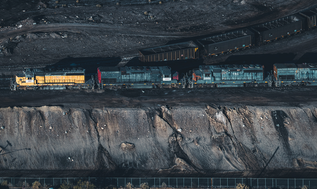 Aerial black gold fine art industrial Mining mitch rouse oil phase one train transportation