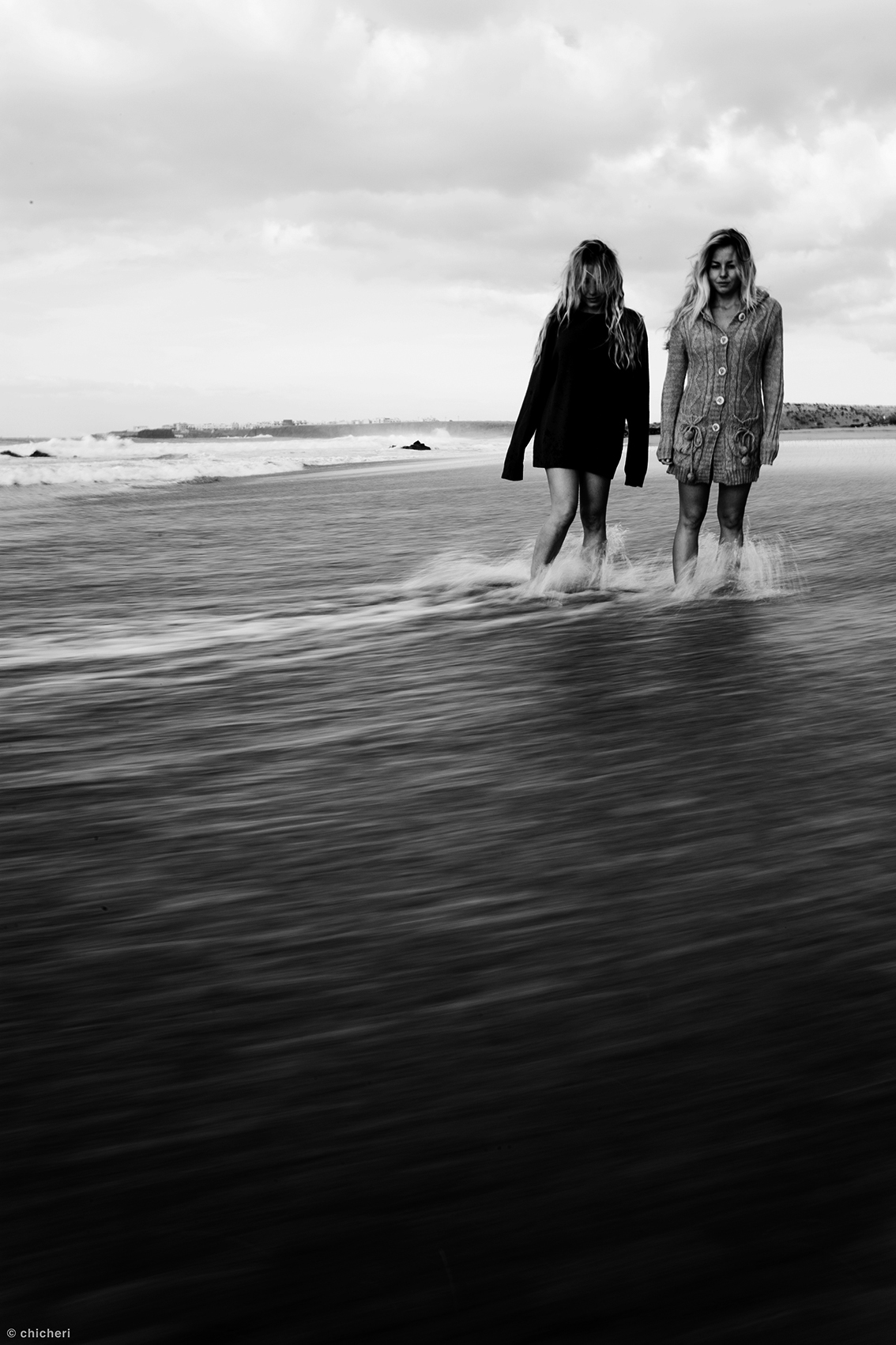 beach girls cold sea Ocean waves sand rocks Sisters b&w