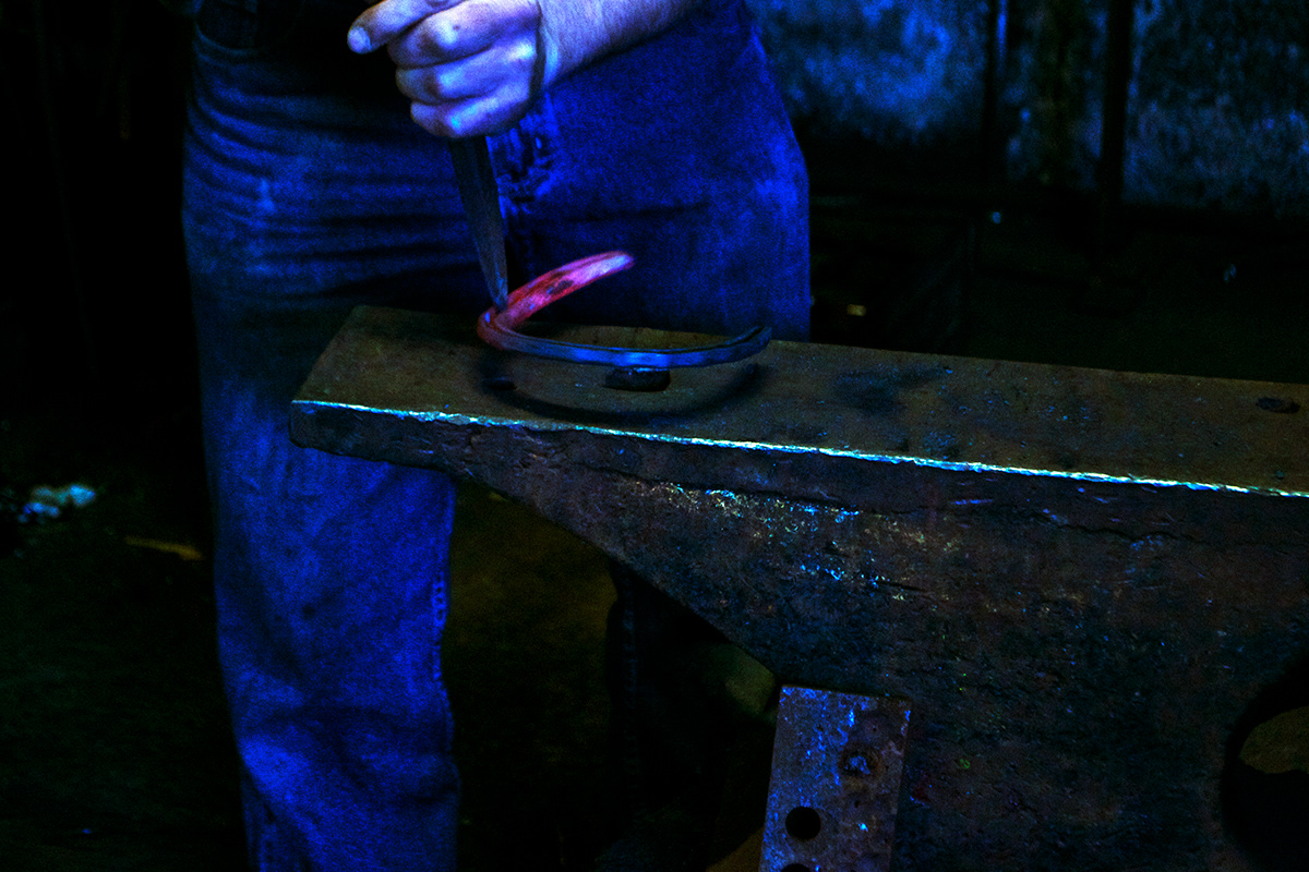 farrier Blacksmith colour vivid horse shoes worker working Labour hammer welding sparks tradition old craft