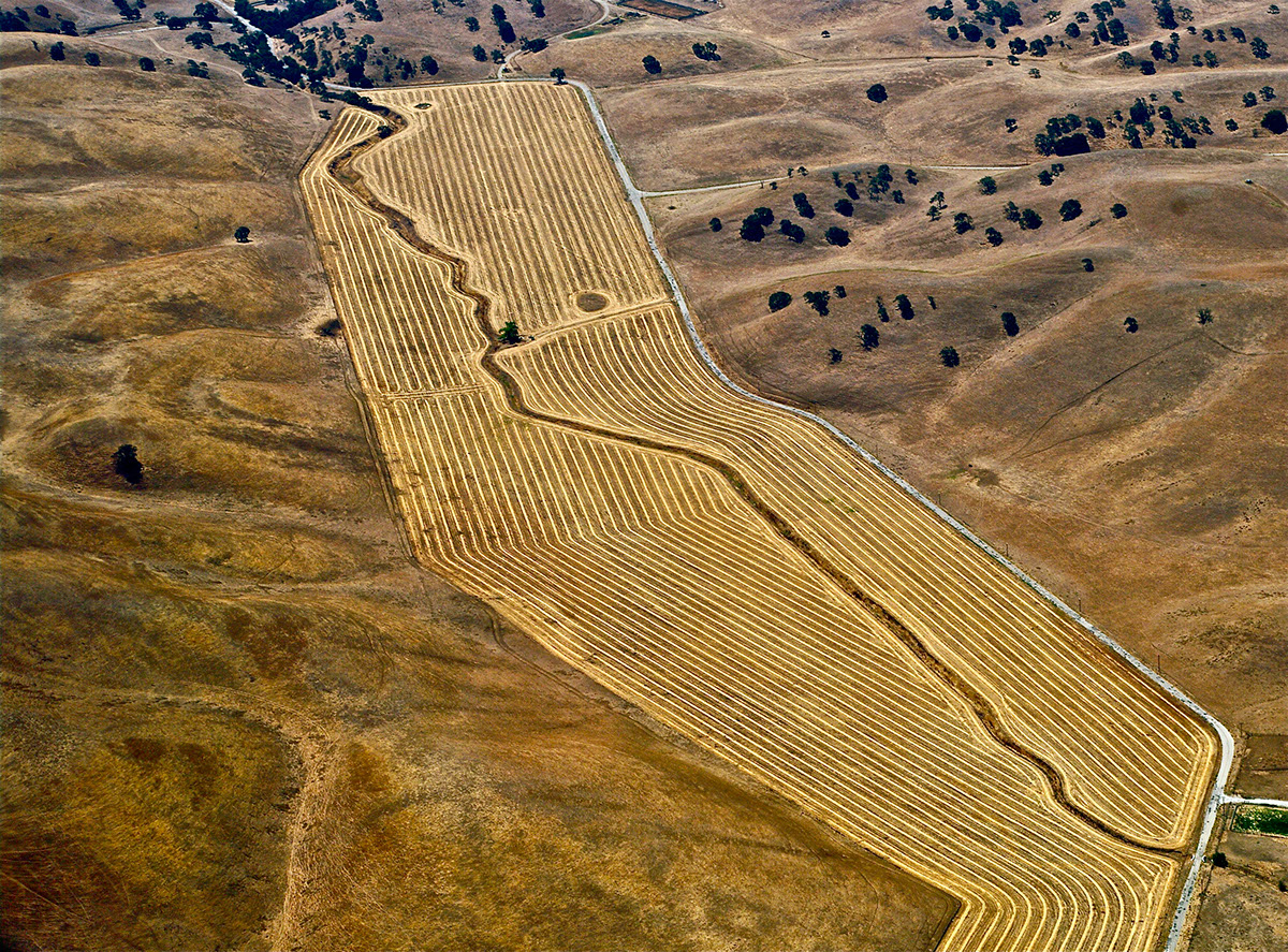 aerial photography. fields hay earth tones. texture