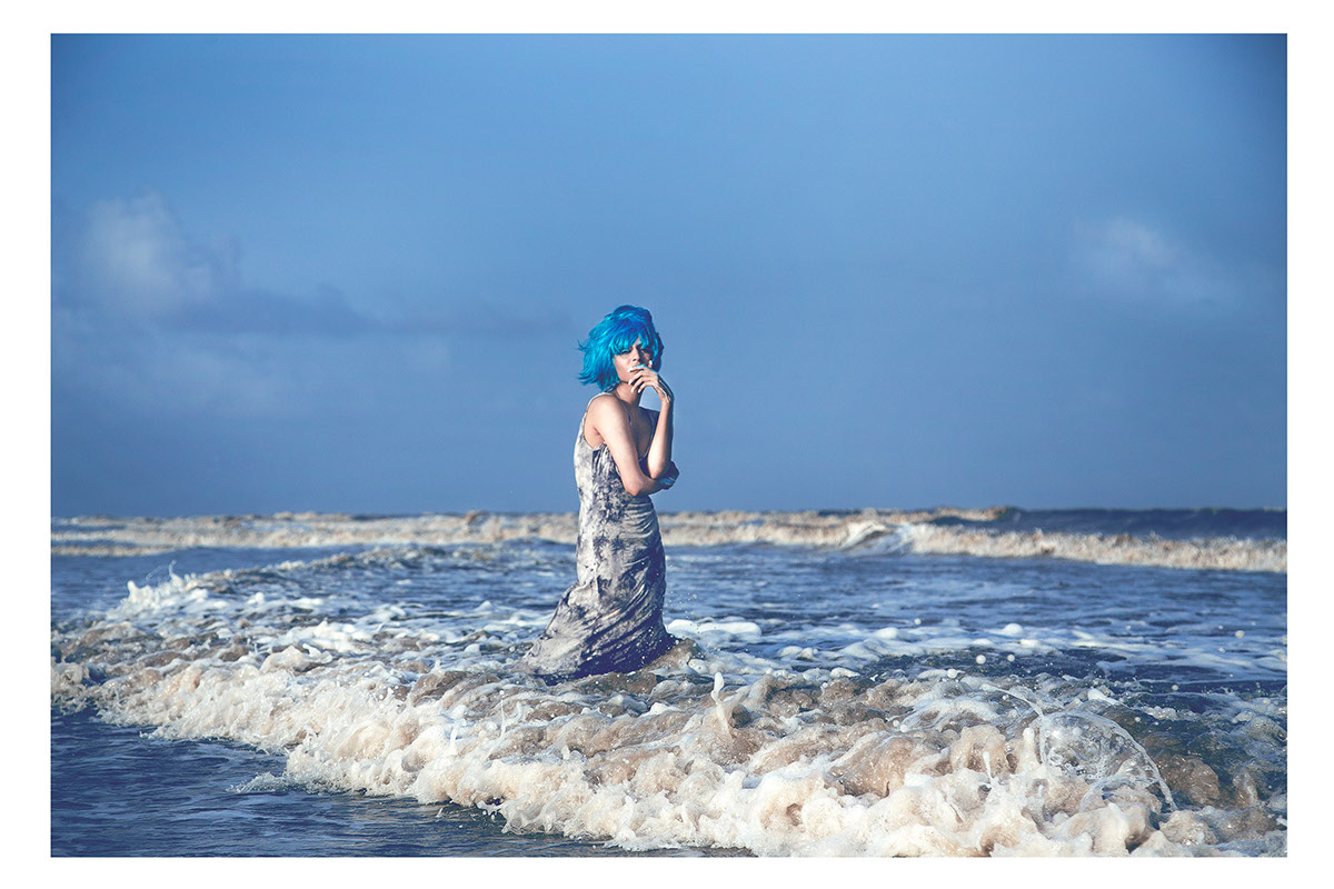 conceptual beach mermaid blue wig fairytale