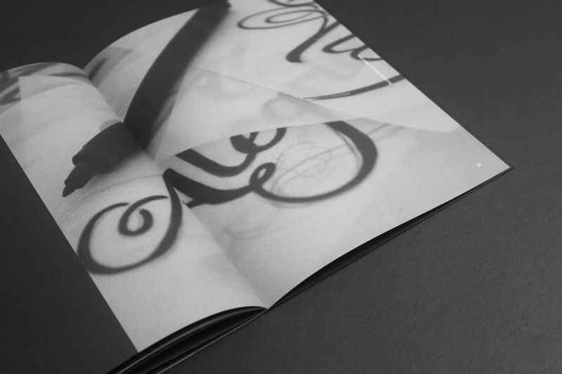Promotion print black logo identity black on black Booklet emboss foil cards design saddle geometric fold book
