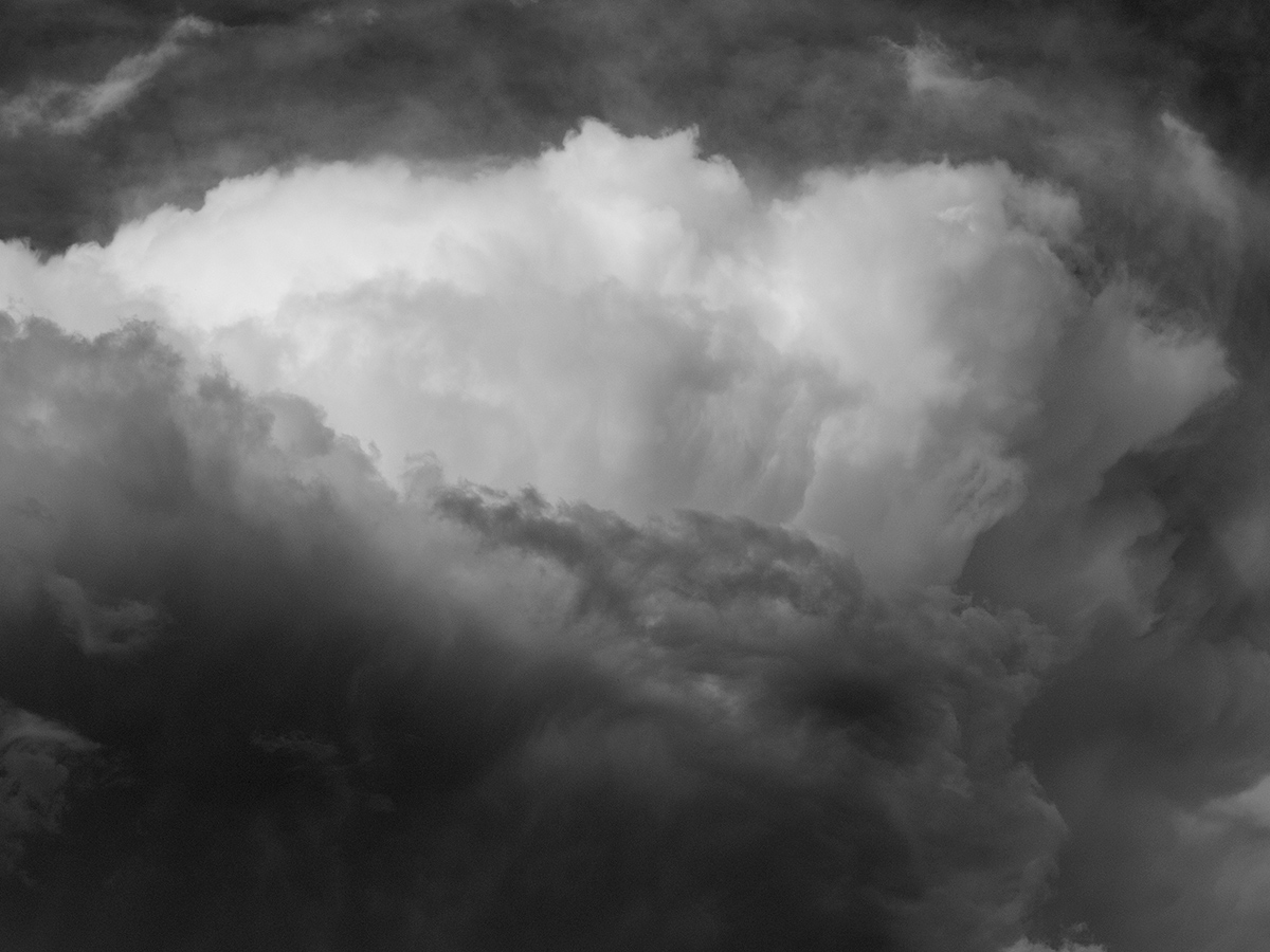 clouds storm plane