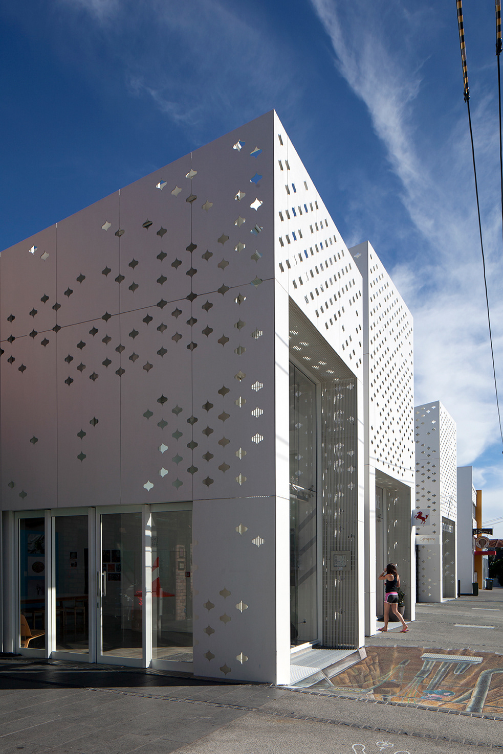 Shops new building temporary White metal pattern newzealand auckland architectrure design Urban Street sculpture facade