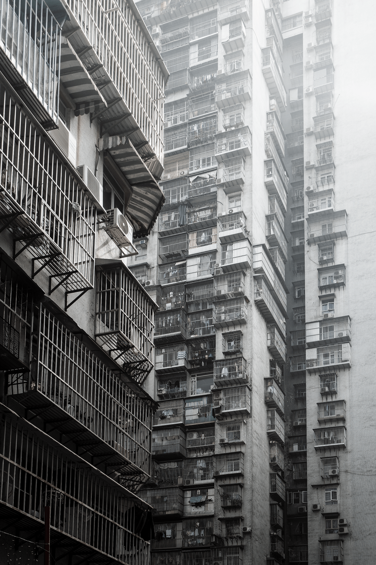 appartments black and white buildings china Dystopia fences futuristic highrises macau Adobe Portfolio
