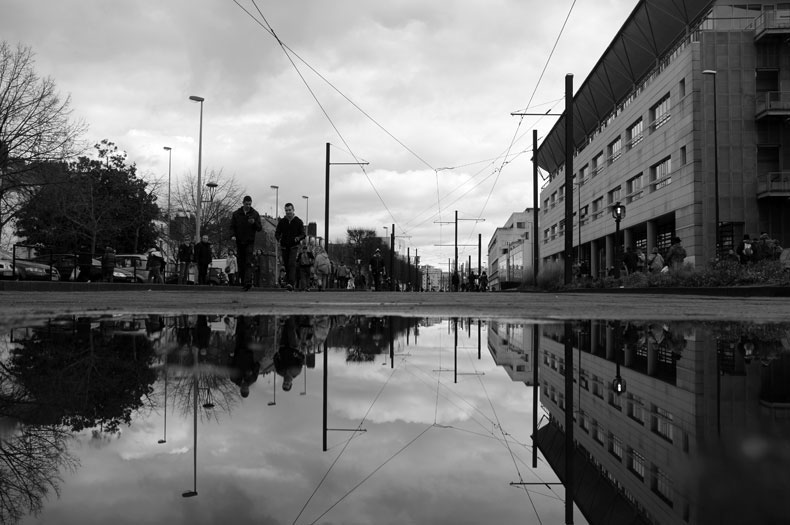 reflection street photography black and white snapshot