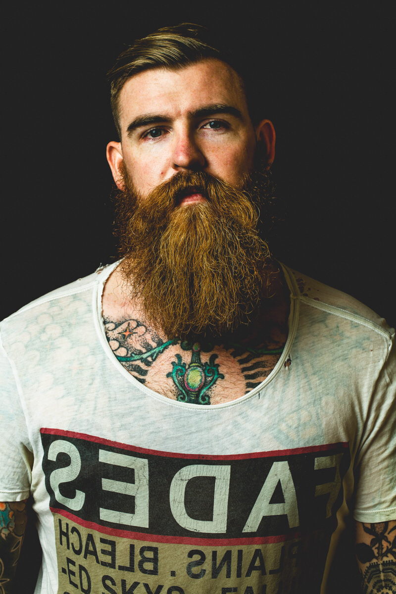 editorial black and white beard tattoo man music rock