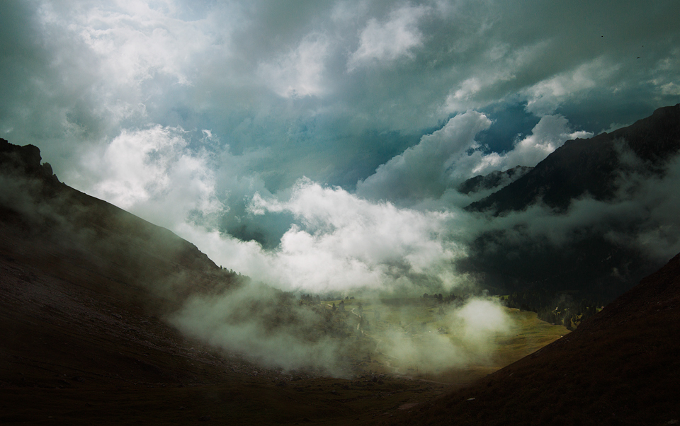 alps alpine mountains fog dark mood person clouds Landscape south tyrol rocks snow ice cold