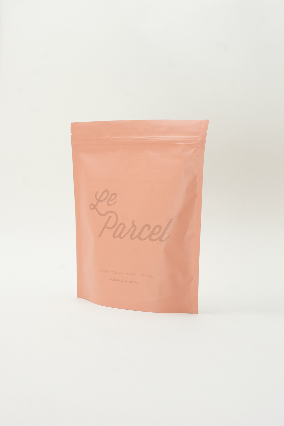 Le Parcel feminine cardboard silkscreen bag system pink colorful pattern product poly bag