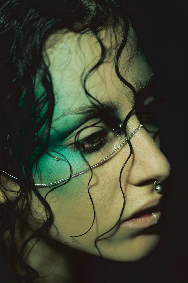 obscure dark reptile green makeup black hairstyle piercing girl nude model woman