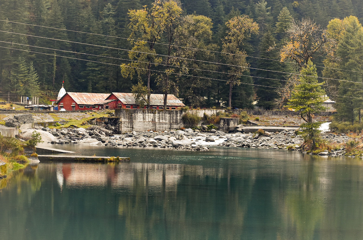 Foggy Mornings surrounding the crystal clear water in the Barot Valley.