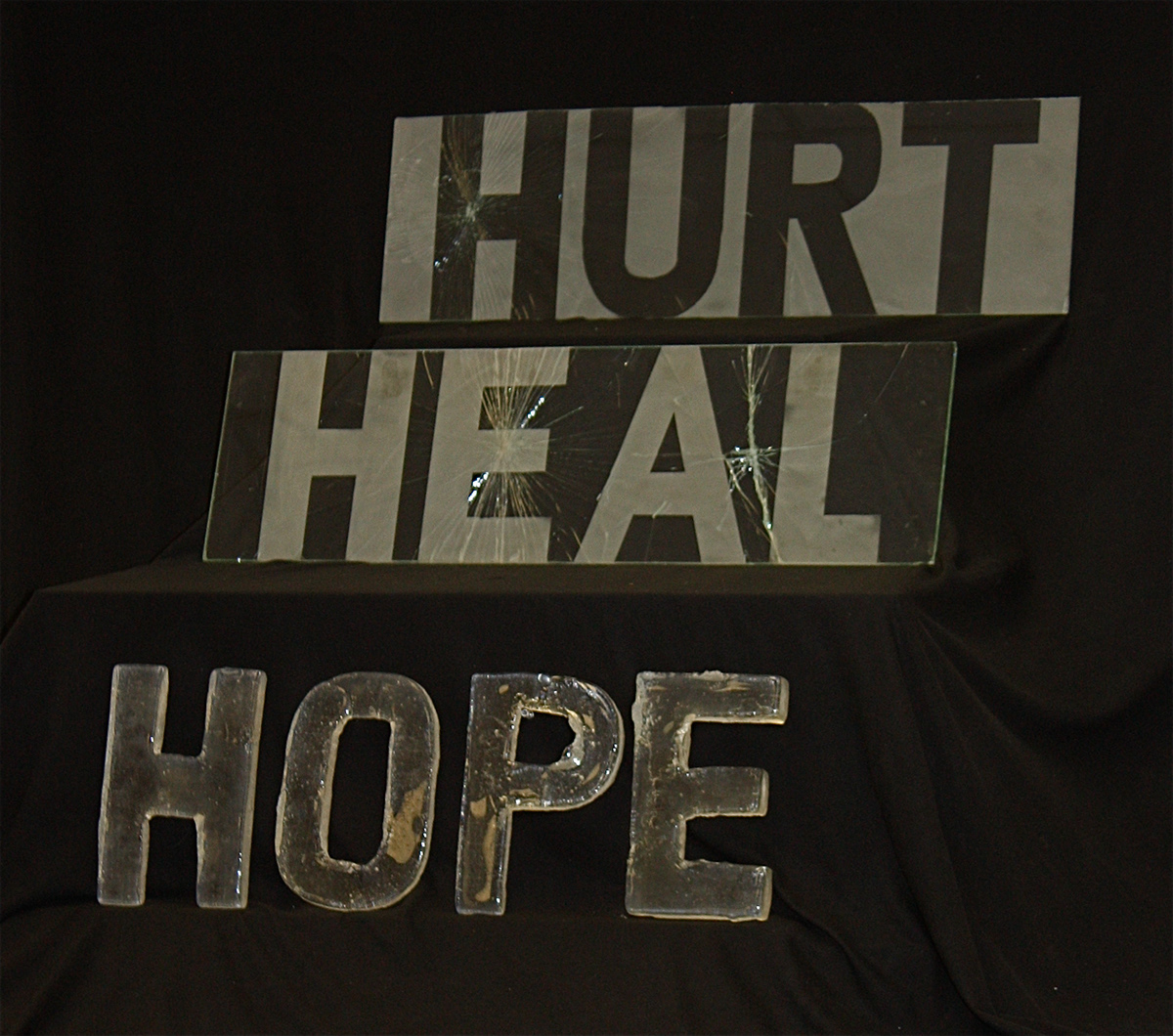 hurt heal hope glass sand cast art sculpture