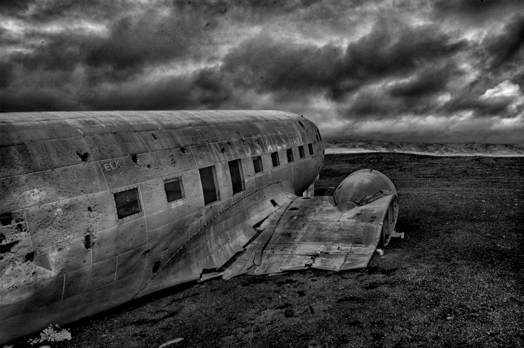 DC3 black beach volcanic beach plane crash anti war editorial-photography