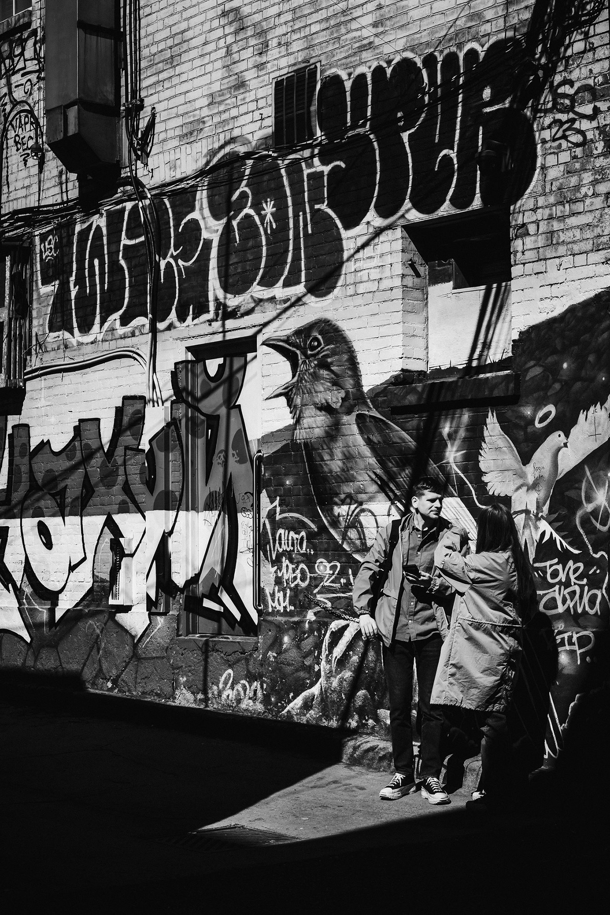 Toronto street photography Graffiti monochrome candid portrait