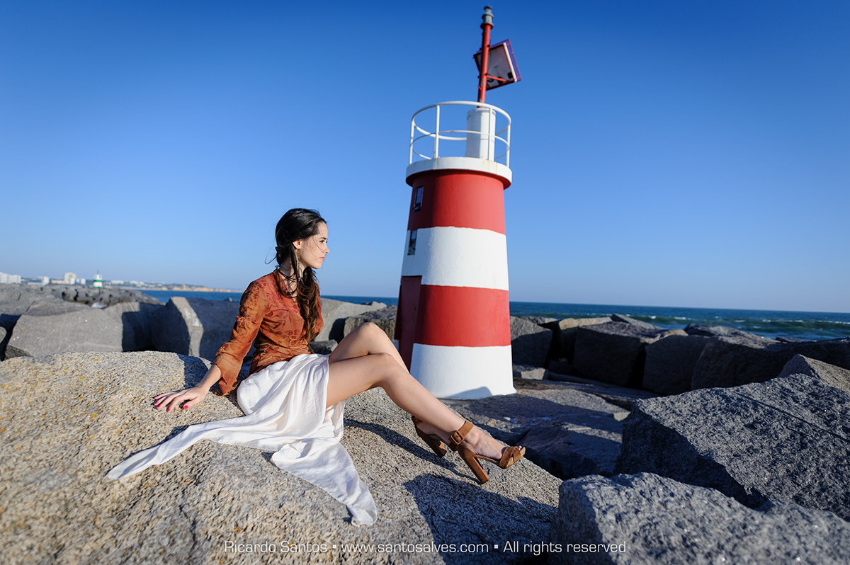 beach lighthouse Algarve Portugal
