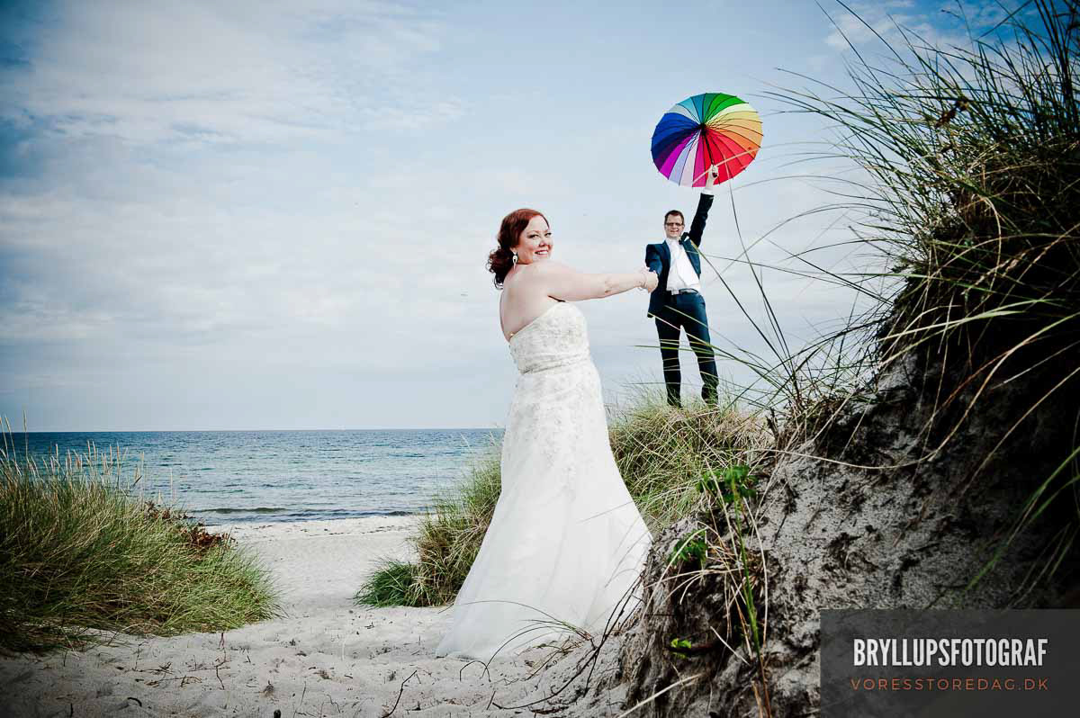 Image may contain: outdoor, wedding dress and sky