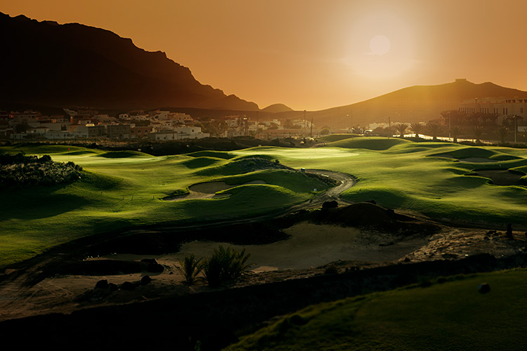 sunset light golf player golf course golf golf flag putting green playing golf playitas playitas golf playitas golf course Fuerteventura sjoman art jacob sjoman photographer jacob sjoman jacob sjoeman photographer golf photography golf photography expert Golfer golf landscape photographer travel destination playitas resort natural hills mountain plateaus undulations golf architect travel resort John Chilver Stainer Landscape photographer nature photographer