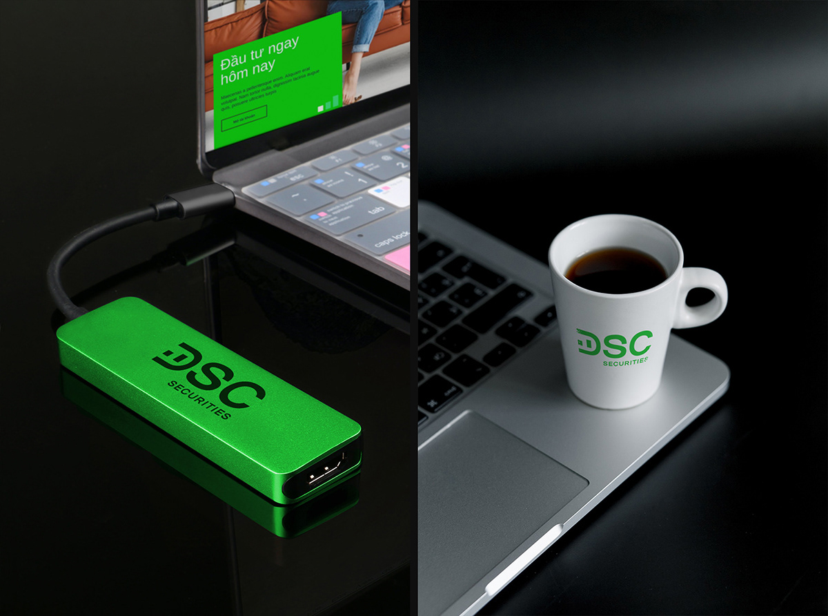 DSC usb and cup on a laptop mockup.