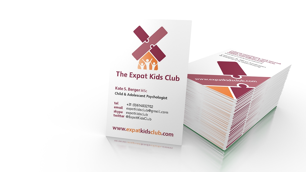 Adobe Portfolio logo  Expat kids club  netherlands windmill Jigsaw children orange purple