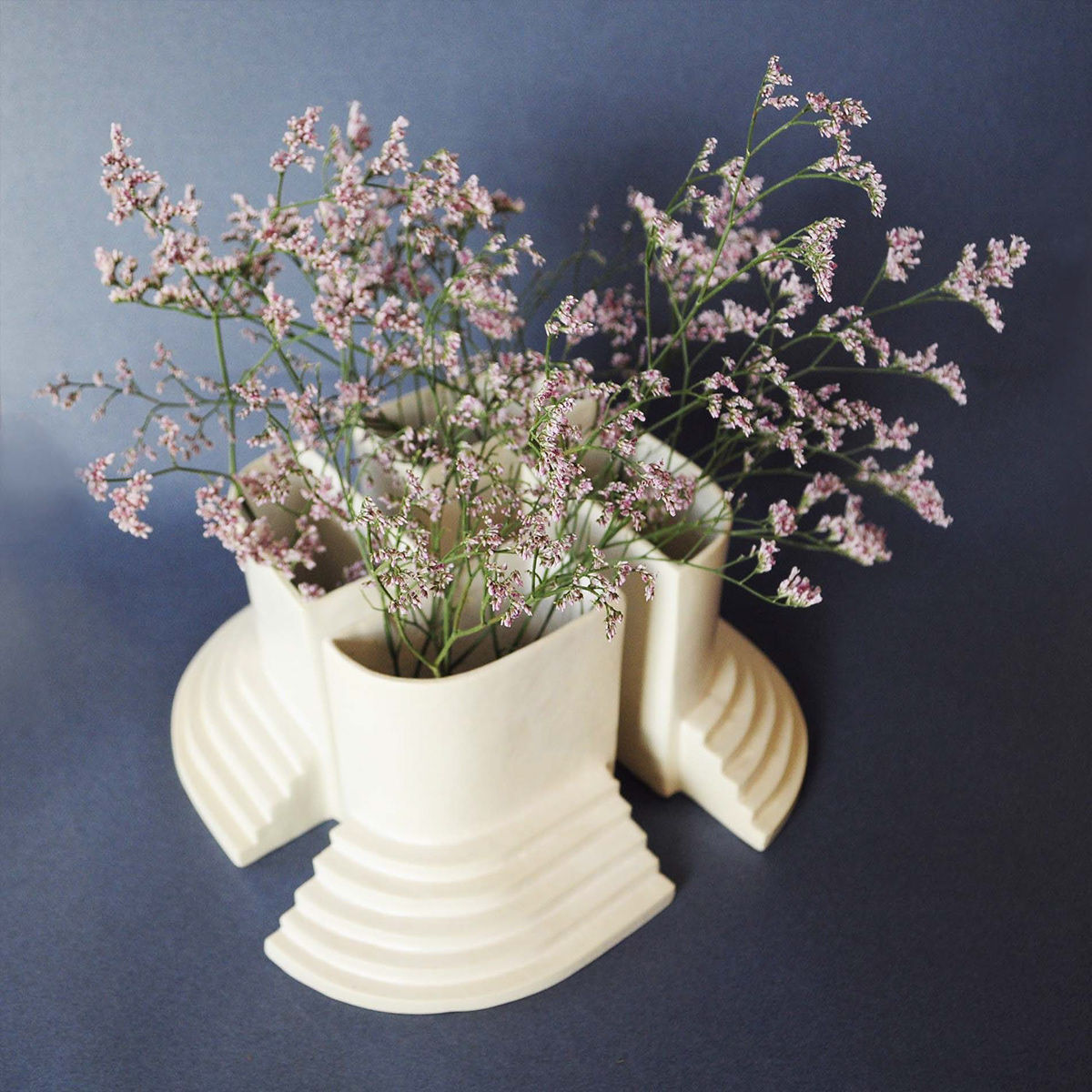 Adobe Portfolio ceramic vase minimal stairs Book end.