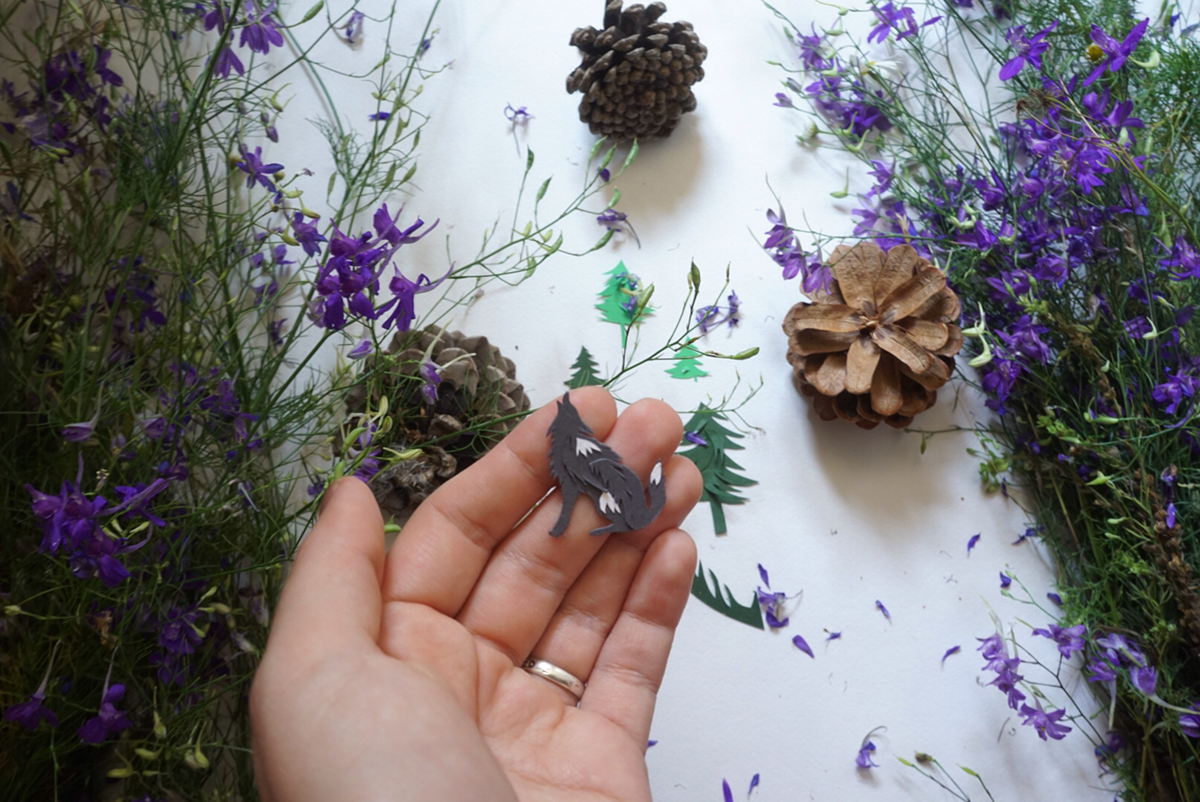 paper cut sculpture wolf boy leaf leaves fairytale