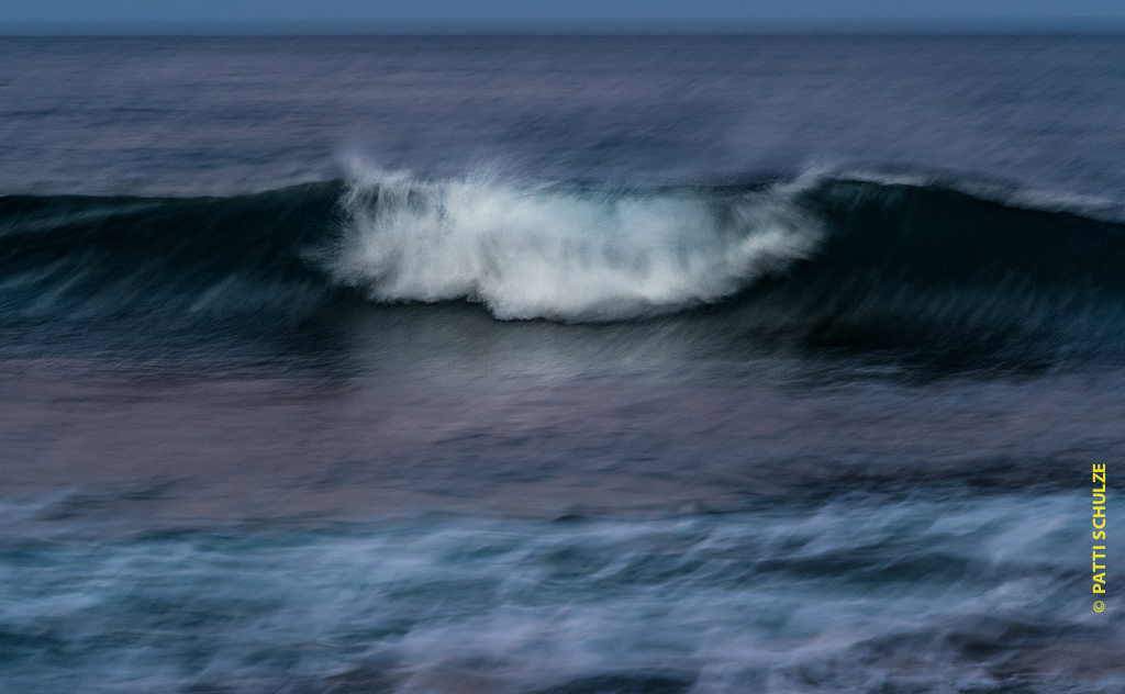 Surf waves panning slow shutter