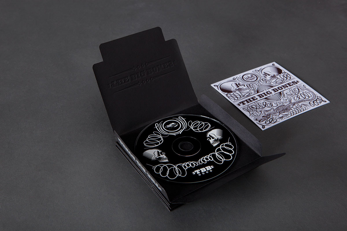 letterpress emboss 1 ink black silver CD packaging skulls