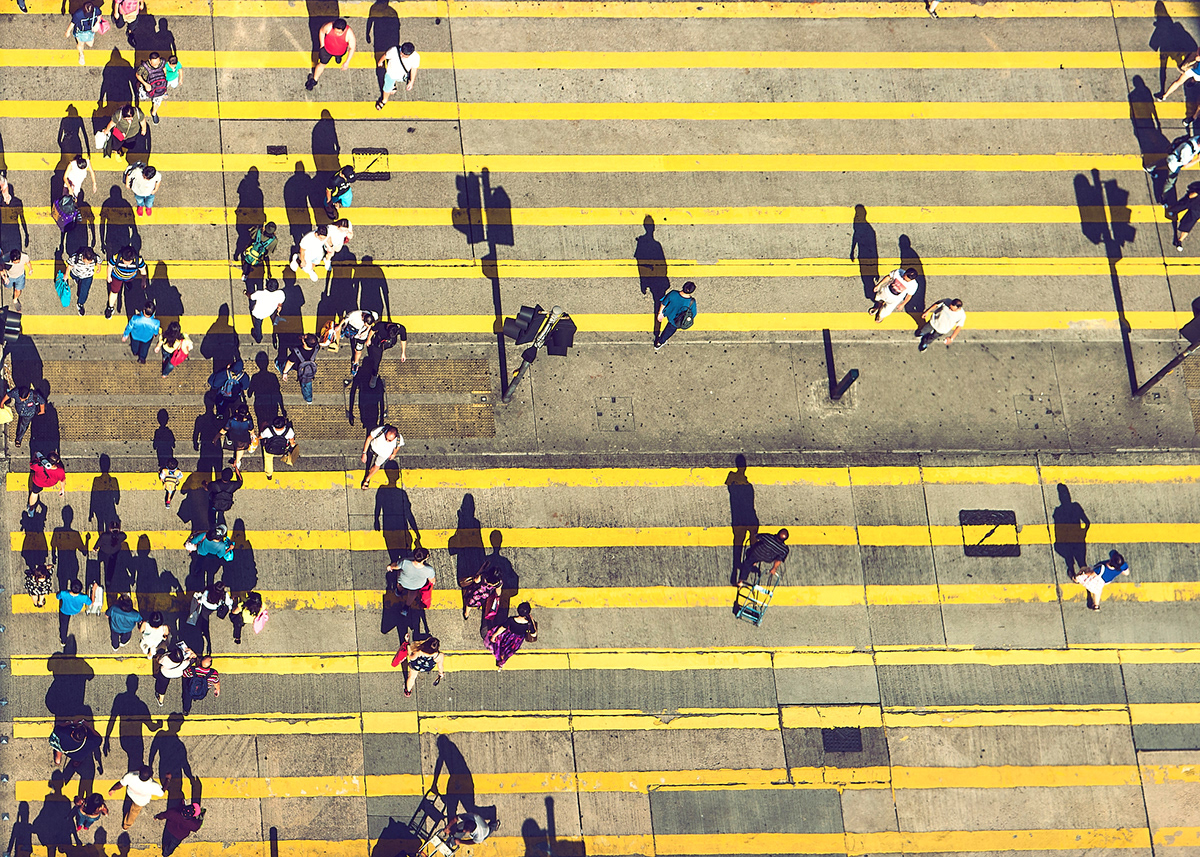 People on a crosswalk. Elevated view. Hong Kong.