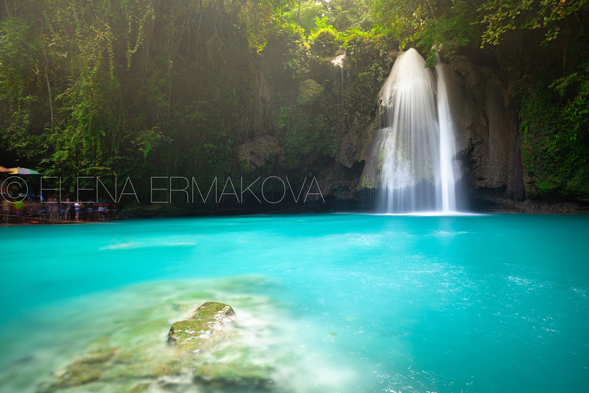 Incredible turquoise-colored Kawasan waterfalls located on Cebu Island, Philippines