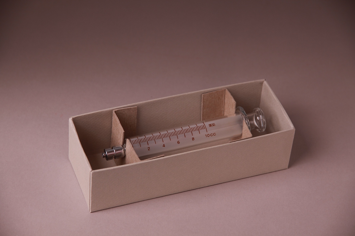 syringe injection vintage design package box aged parsons