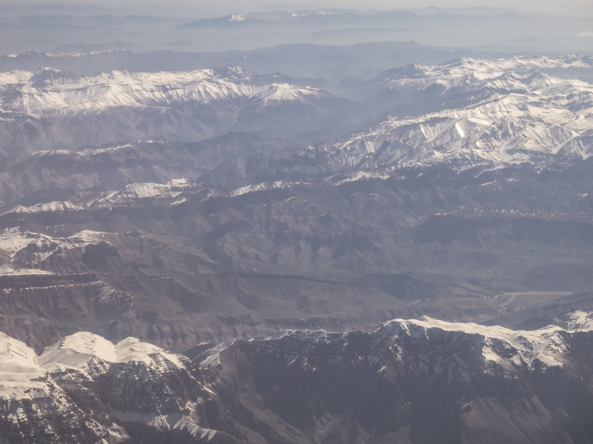 Aerial mountain zagros Iran plane MORNING light colors snow rocks peak minimalistic places Travel view