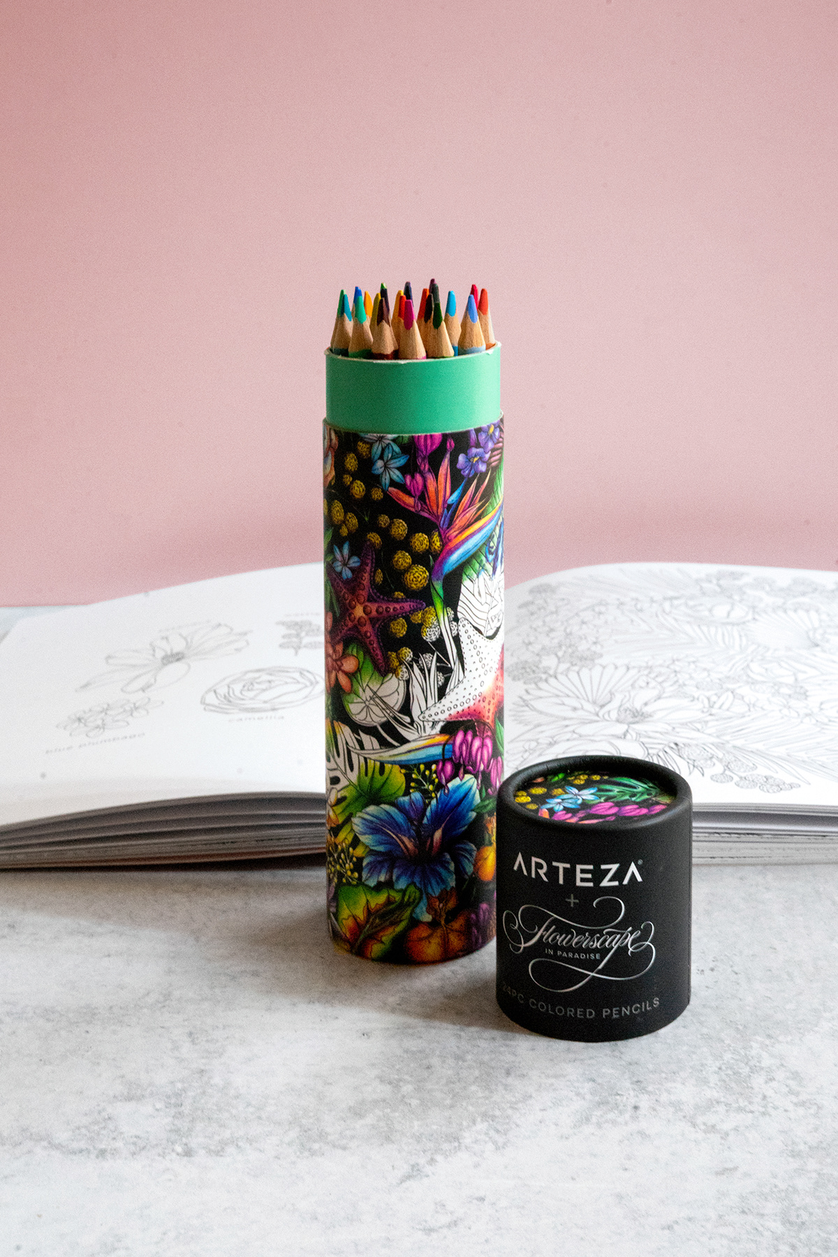 image of colored pencils in a tube, package is covered in tropical flowers.