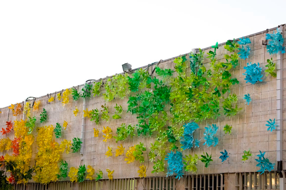 Shmita Flowers haredi ultra orthodox community community center recycle reuse bottle facade recycle bottels Flowers