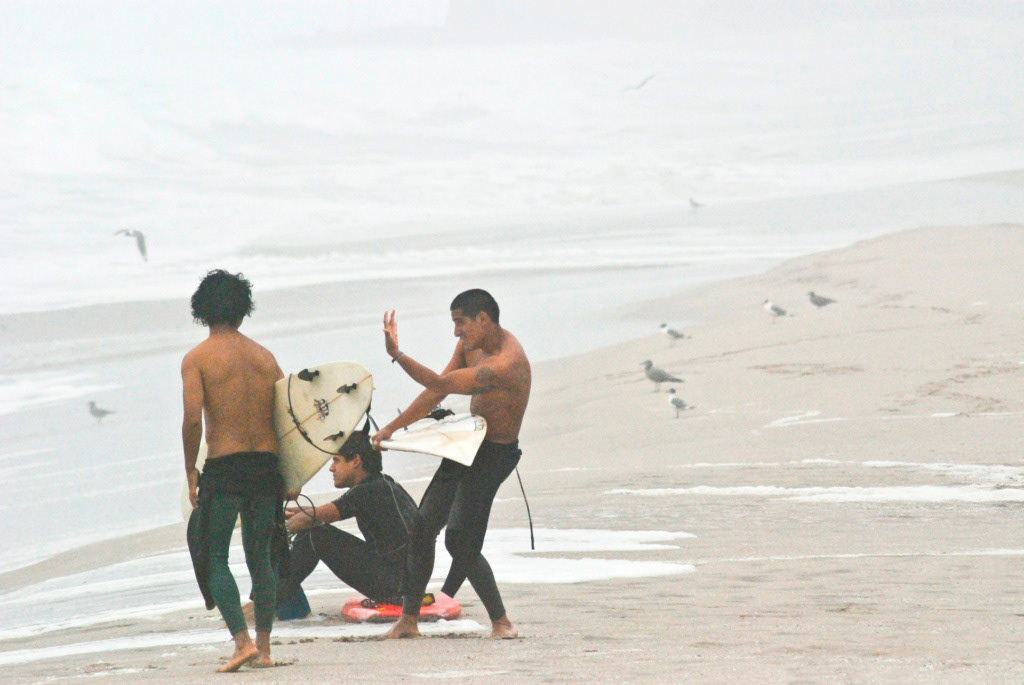 Surfers photo beach