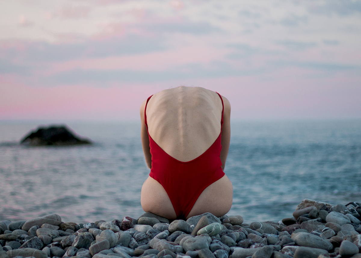 red body sea swim swimwear girl stone rock portrait