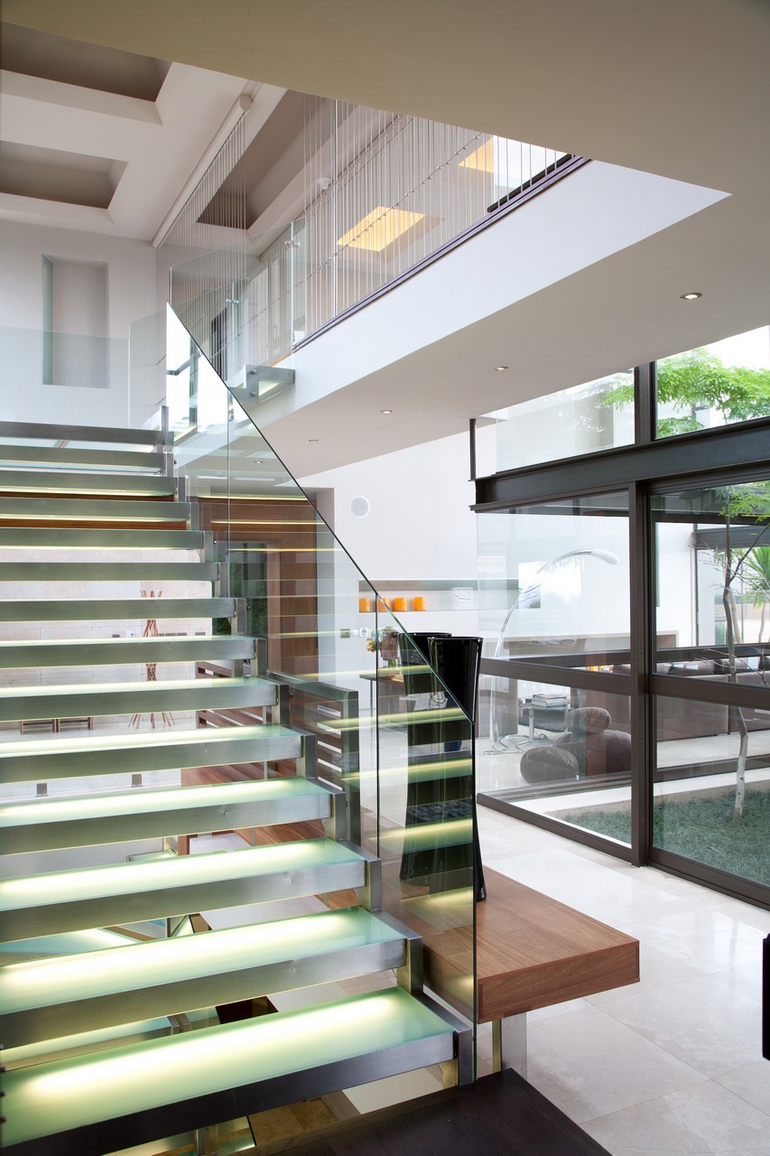 design  interior  luxury  contemporary open plan modernism Glass and concrete glass staircase water feature double volume