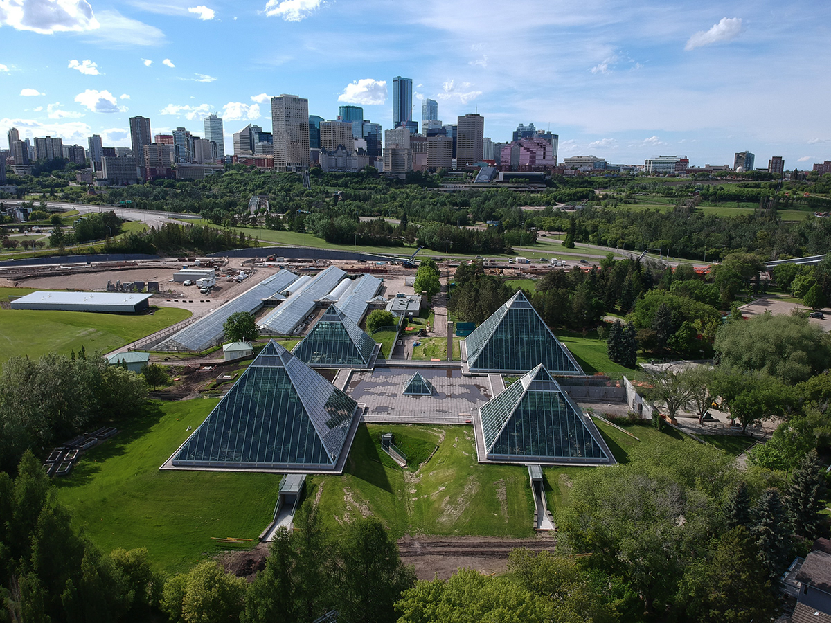 Muttart Conservatory and Botanical Gardens stand amongst the lush river valley in Edmonton 