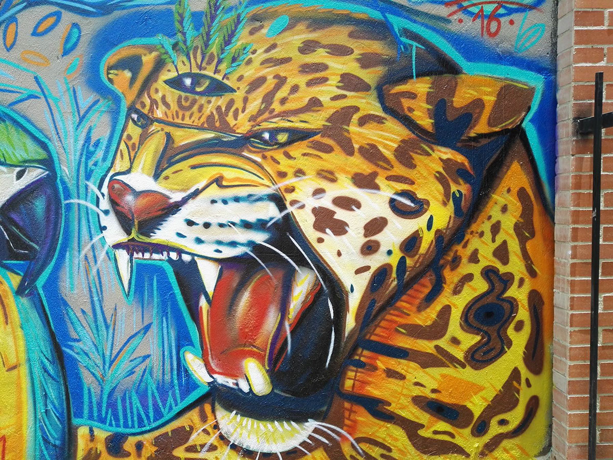 MURALISMO colombia jaguar guacamaya