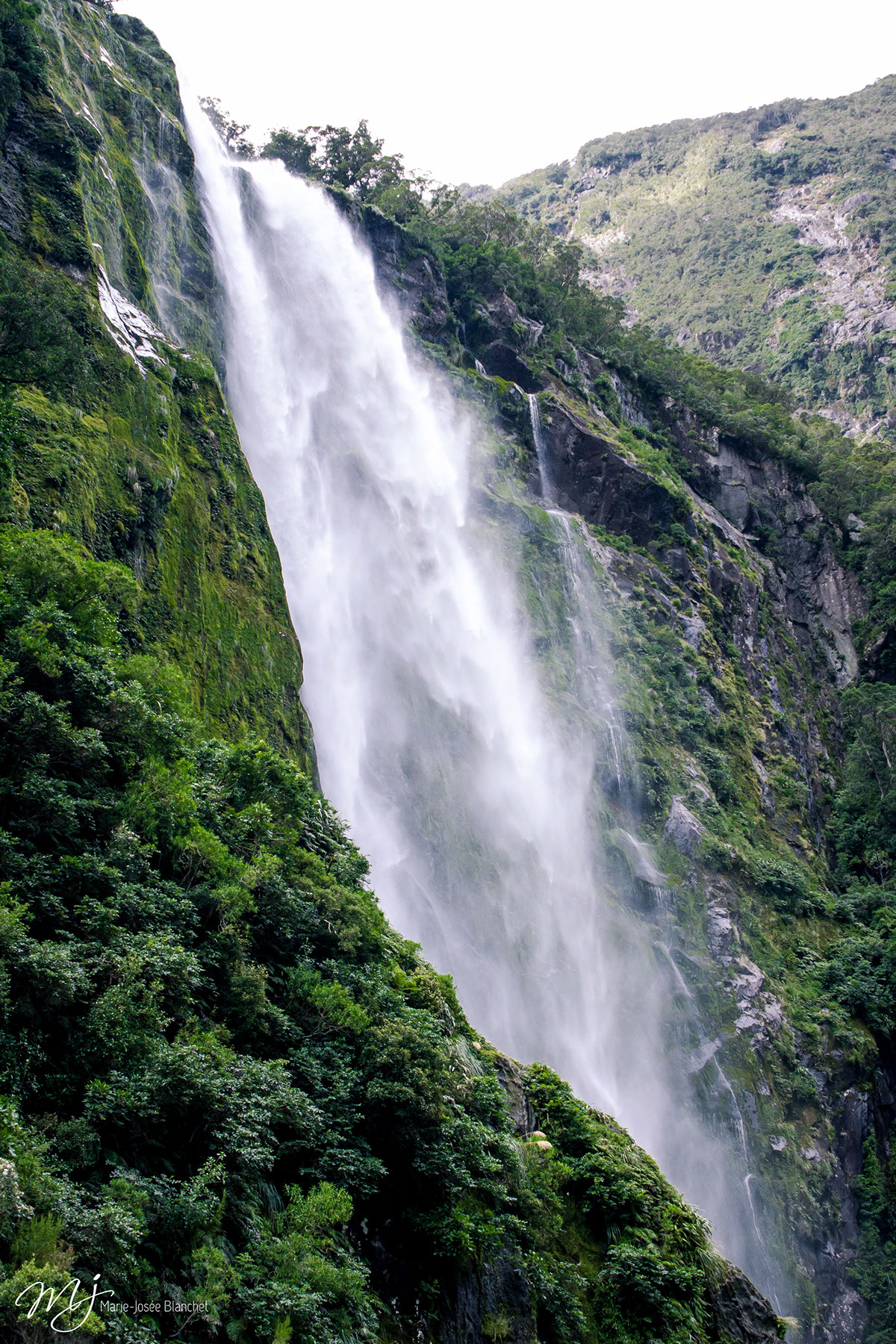 New Zealand sound waterfall Island mountains valley clouds fog forest
