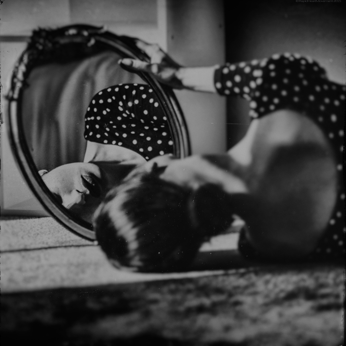photo conceptual black and white mirrored portrait RapidHeartMovement