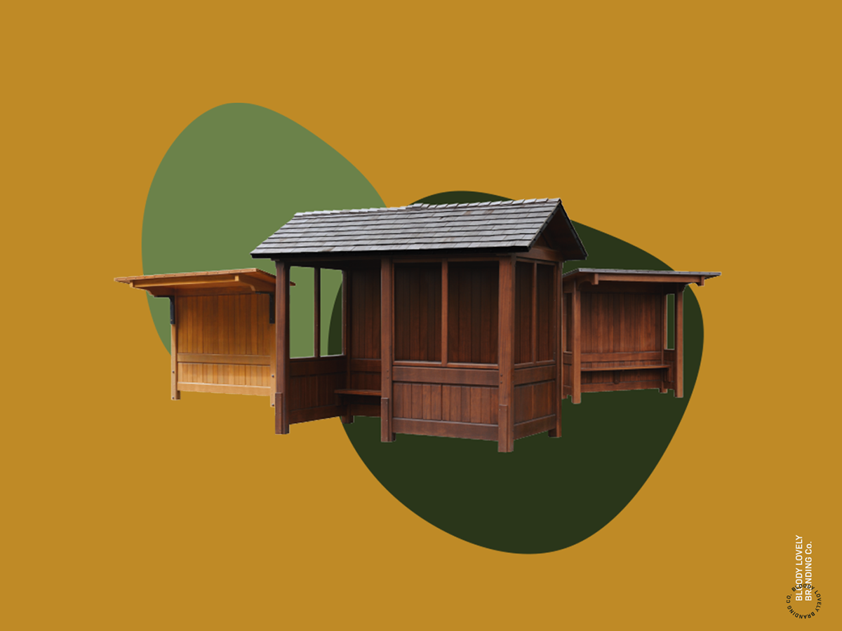 Mustard yellow background with three wooden bus shelters sat on top of two shades of green shapes
