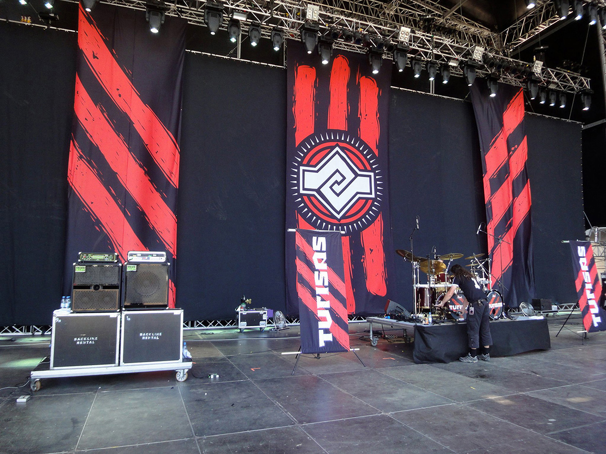 turisas hands red black stripes Stage backdrop vector chris honeywell metal