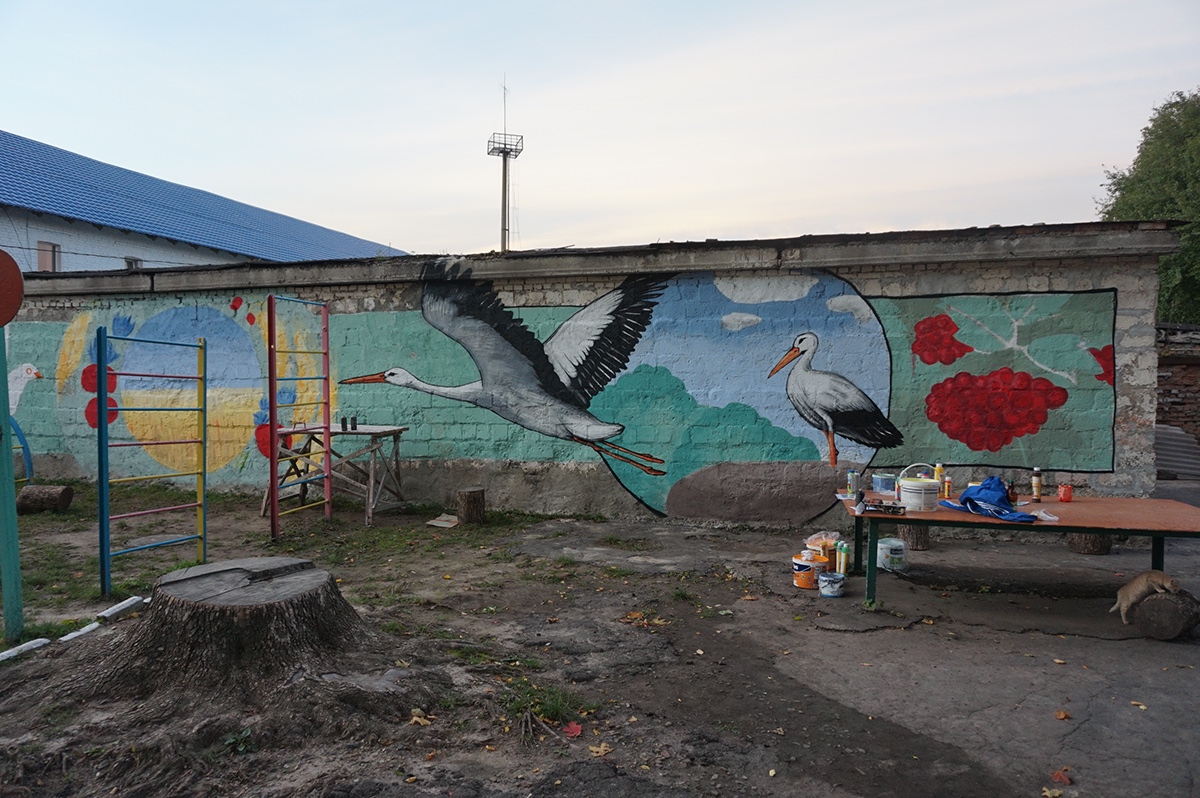 Storks dove children school ukraine wall